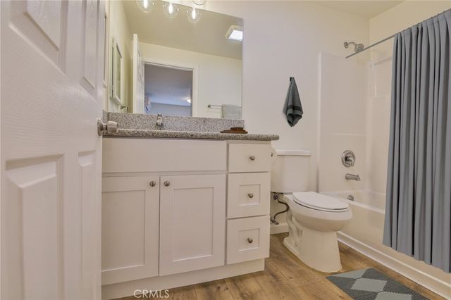 a bathroom with a toilet and a sink