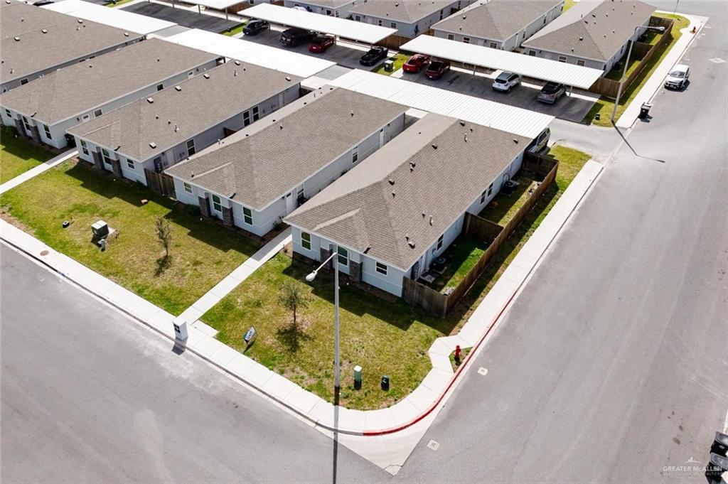 1908 Davenport Street, Unit 4 Weslaco, TX 78596 - Photo 2 of 12 an aerial view of a house with a swimming pool