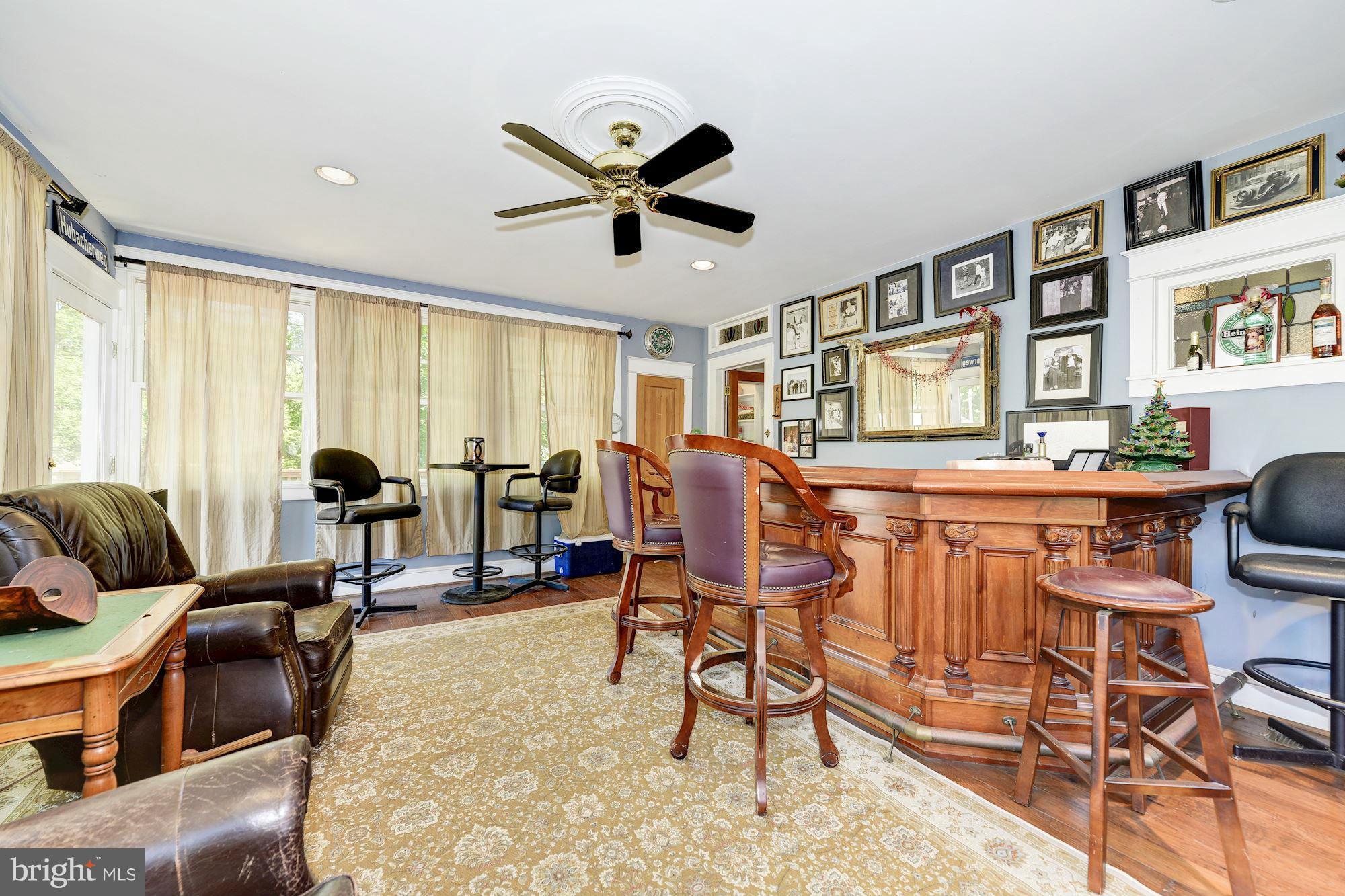 4011 Gallows Road Annandale, VA 22003 - Photo 12 of 27 a living room with furniture and a large window