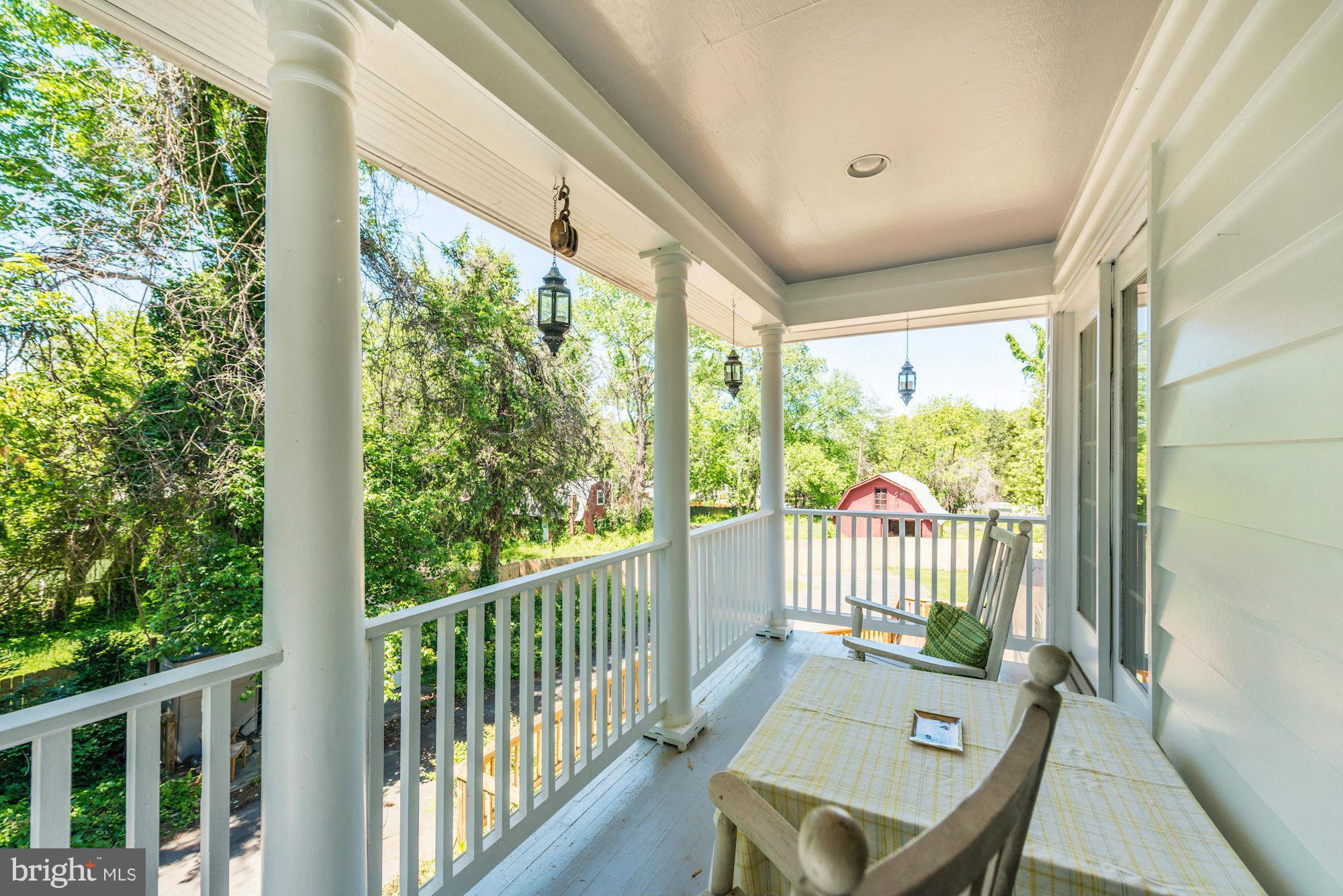 4011 Gallows Road Annandale, VA 22003 - Photo 15 of 27 a view of a chair and table in the balcony