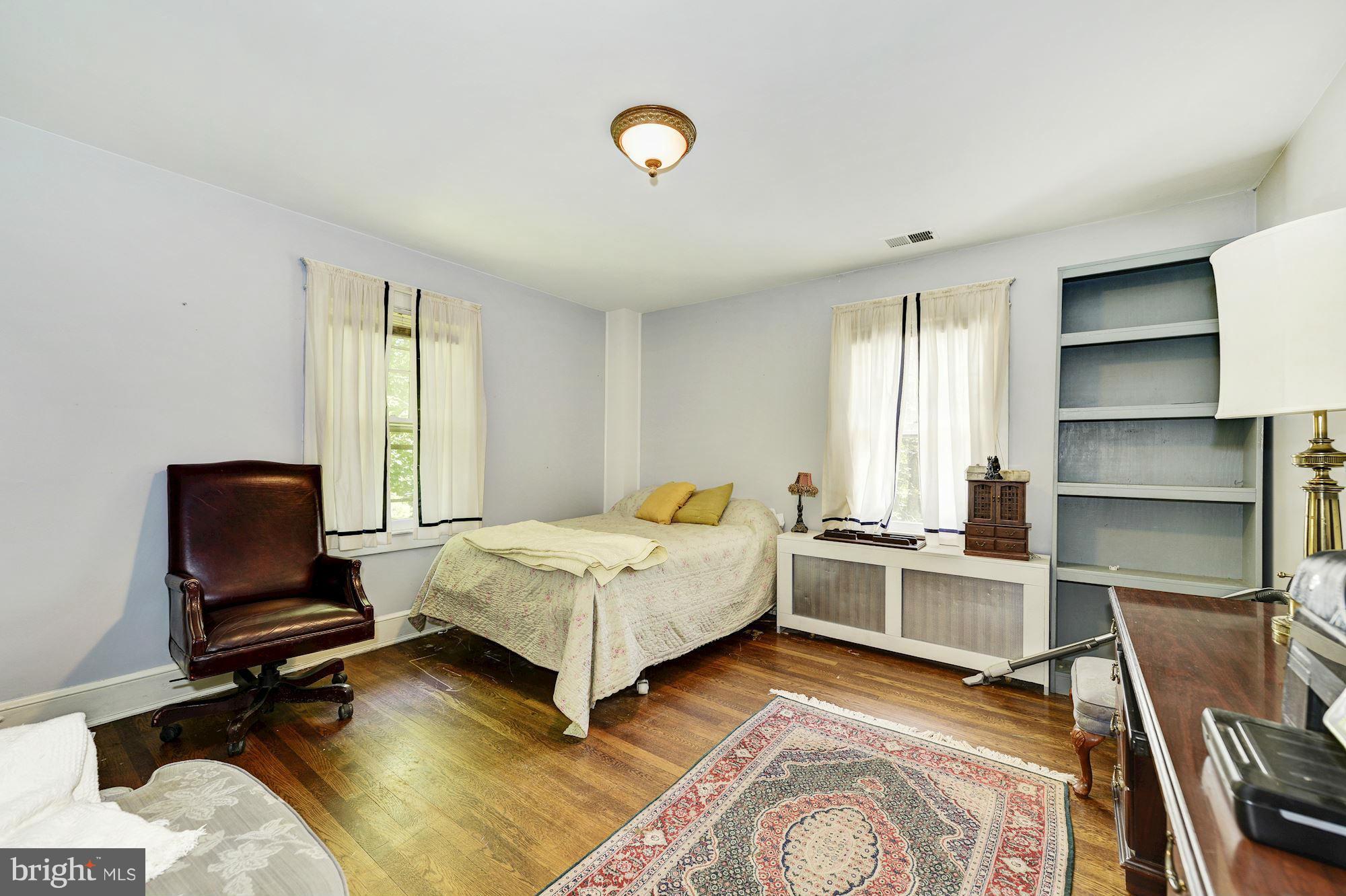 4011 Gallows Road Annandale, VA 22003 - Photo 17 of 27 a bedroom with furniture and a window