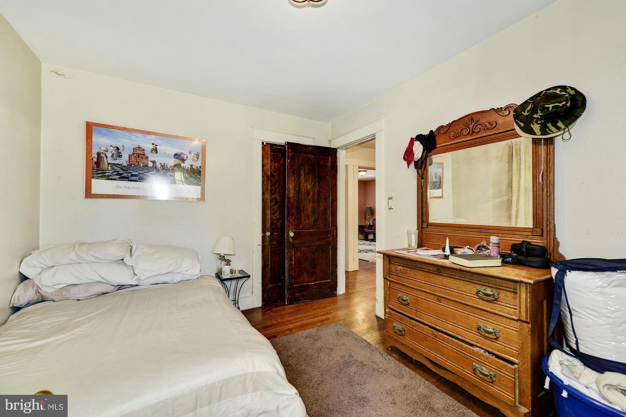 4011 Gallows Road Annandale, VA 22003 - Photo 18 of 27 a bedroom with a bed and a closet