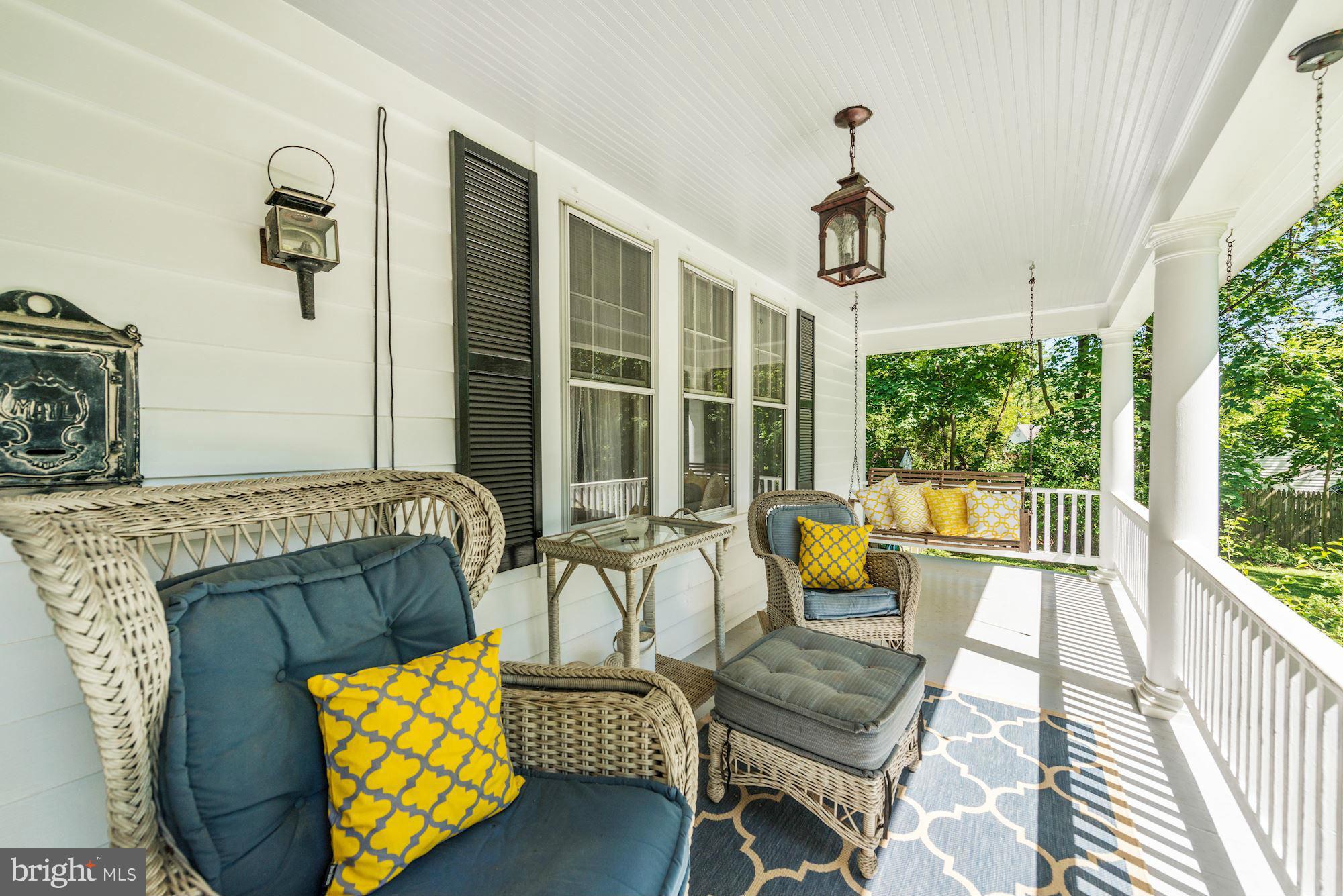 4011 Gallows Road Annandale, VA 22003 - Photo 3 of 27 a living room with furniture and floor to ceiling windows