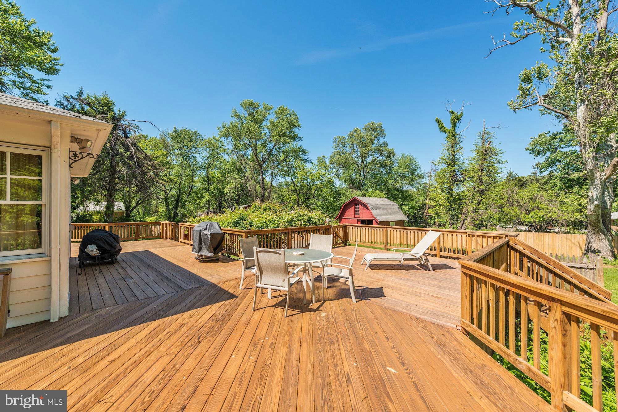 4011 Gallows Road Annandale, VA 22003 - Photo 22 of 27 a view of balcony with chairs and wooden floor