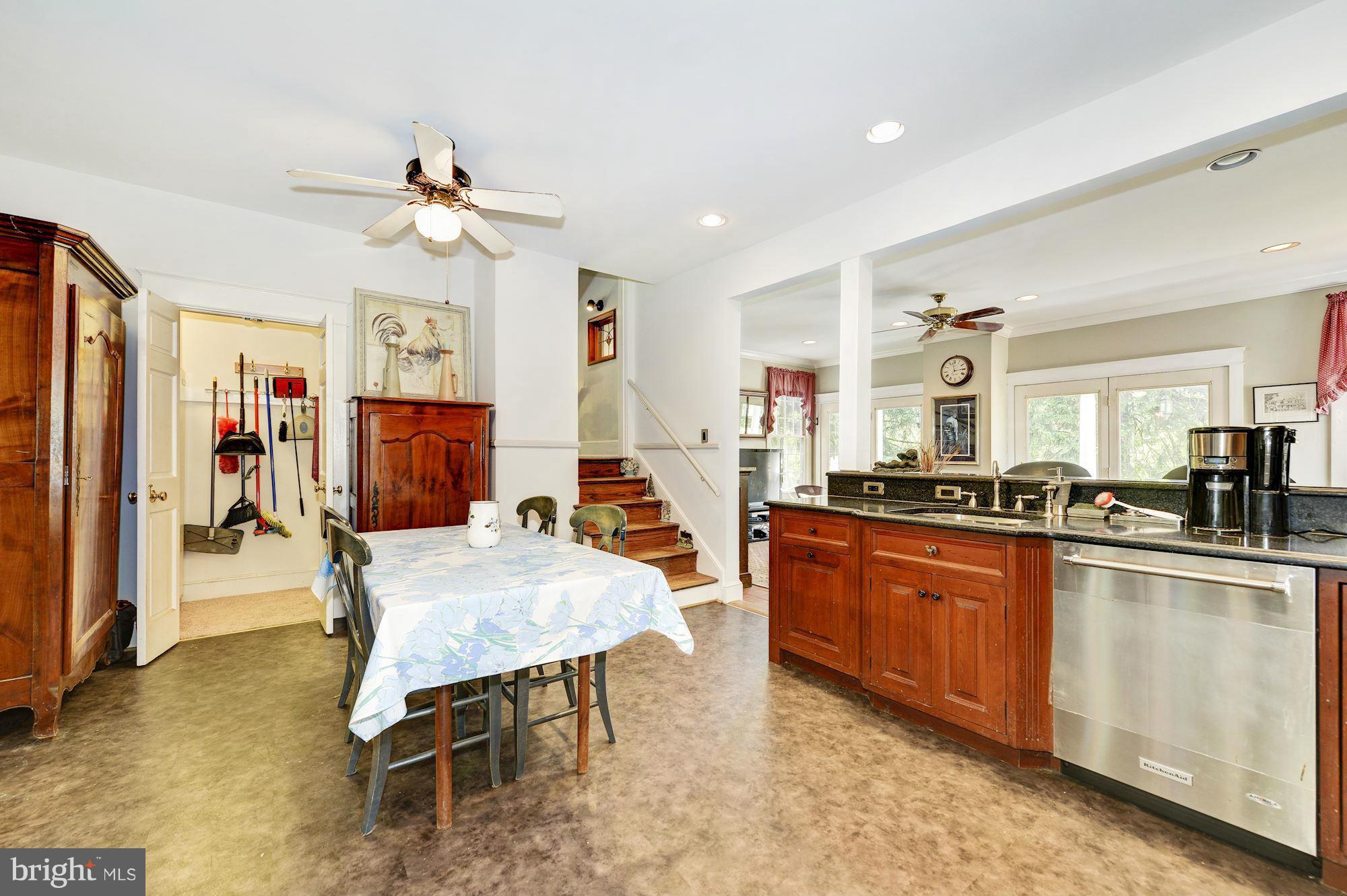 4011 Gallows Road Annandale, VA 22003 - Photo 8 of 27 a large living room with stainless steel appliances granite countertop furniture and a kitchen view