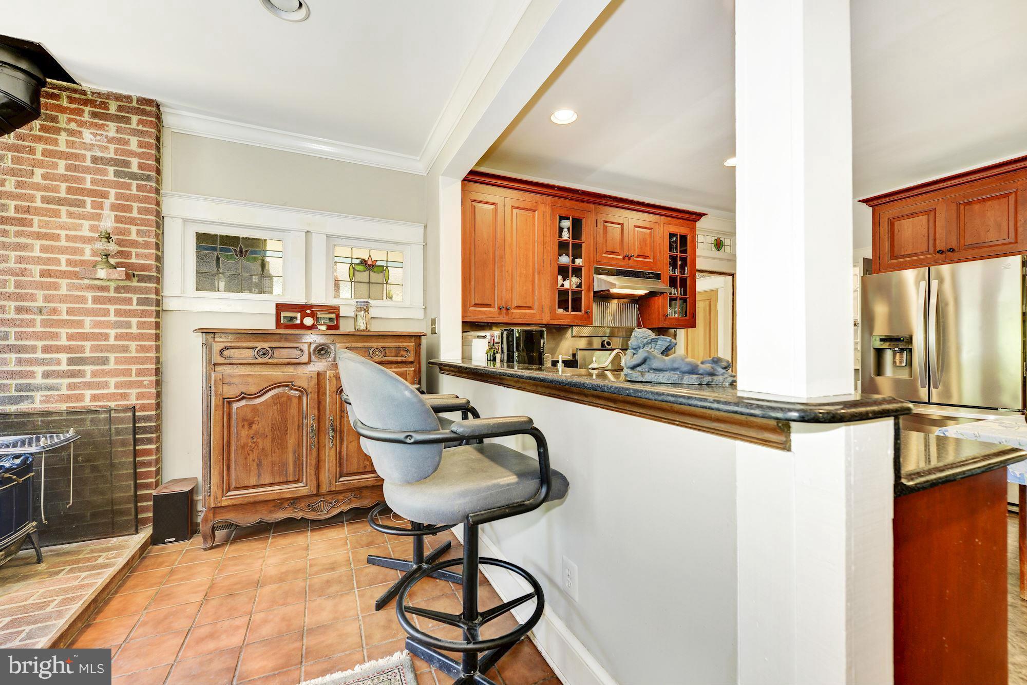 4011 Gallows Road Annandale, VA 22003 - Photo 10 of 27 a living room with furniture a flat screen tv and a large window