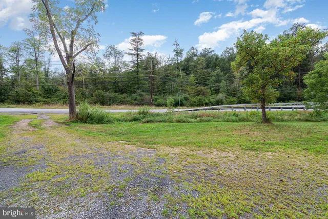 a view of outdoor space and yard