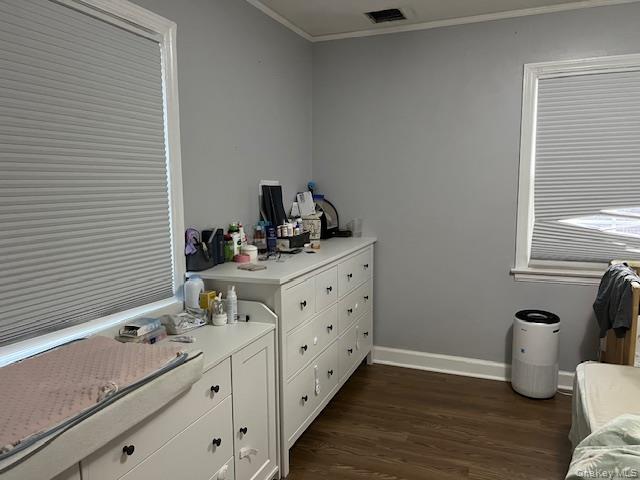 225 Thompson Shore Road, Unit 2F Manhasset, NY 11030 - Photo 3 of 15 a bathroom with a sink and a mirror