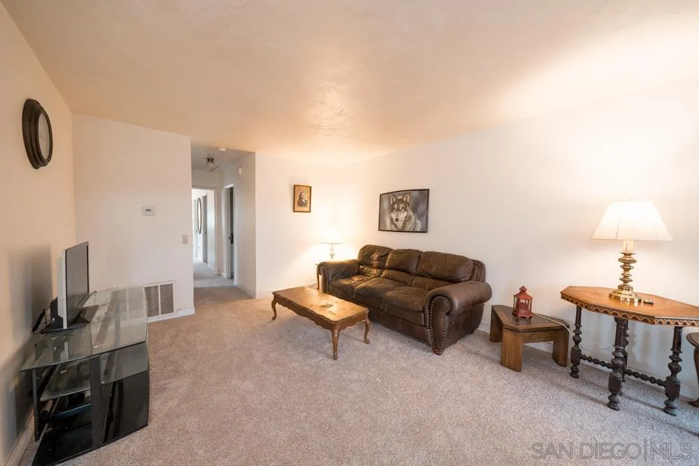 7967 Arly Court, Unit 24 Santee, CA 92071 - Photo 11 of 25 a living room with furniture and a flat screen tv