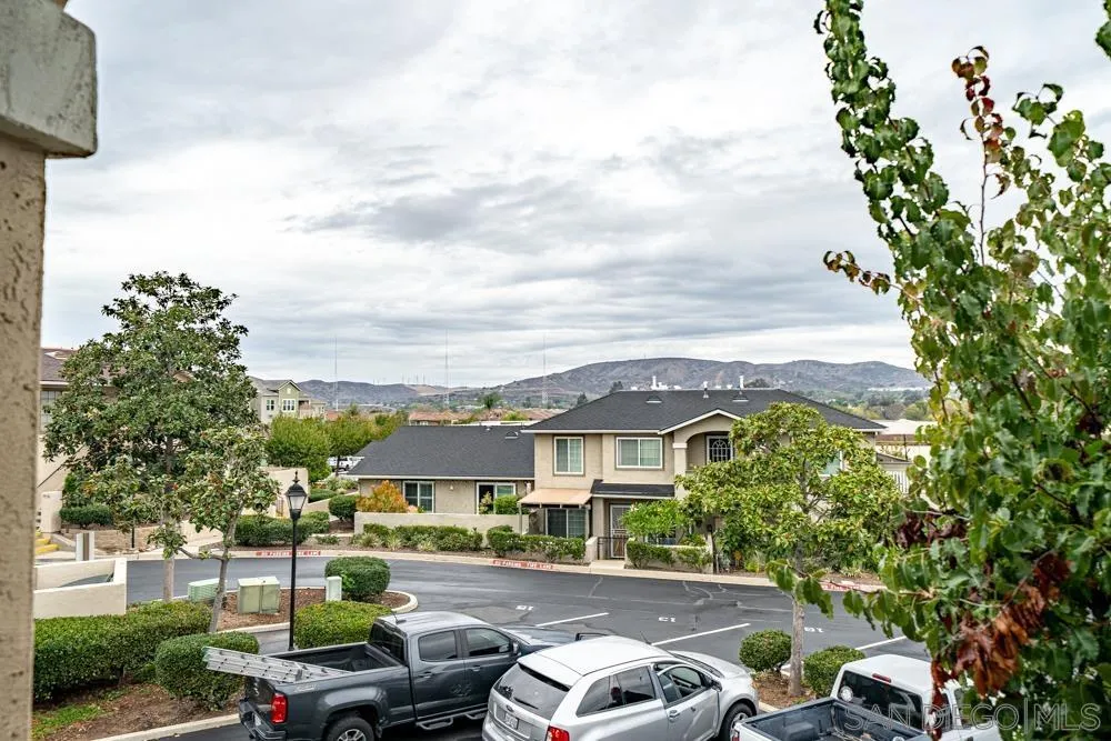 7967 Arly Court, Unit 24 Santee, CA 92071 - Photo 13 of 25 a front view of a house with garden