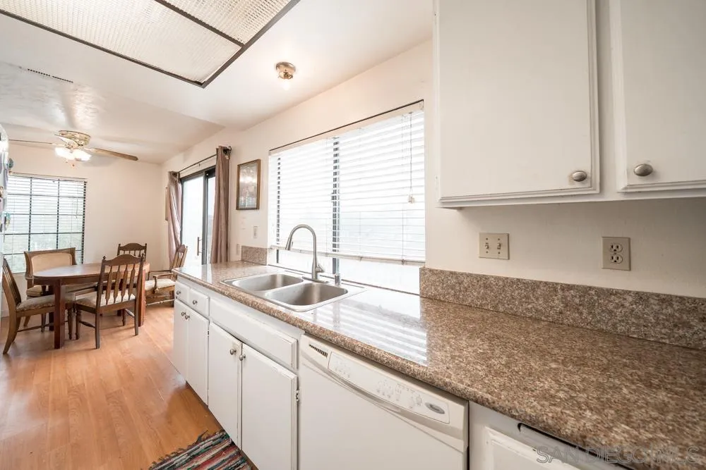 7967 Arly Court, Unit 24 Santee, CA 92071 - Photo 18 of 25 a kitchen with sink and cabinets