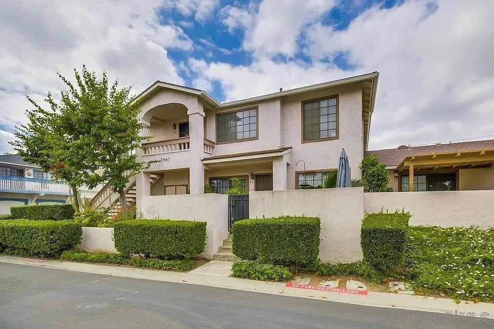 7967 Arly Court, Unit 24 Santee, CA 92071 - Photo 21 of 25 a front view of a house with a yard