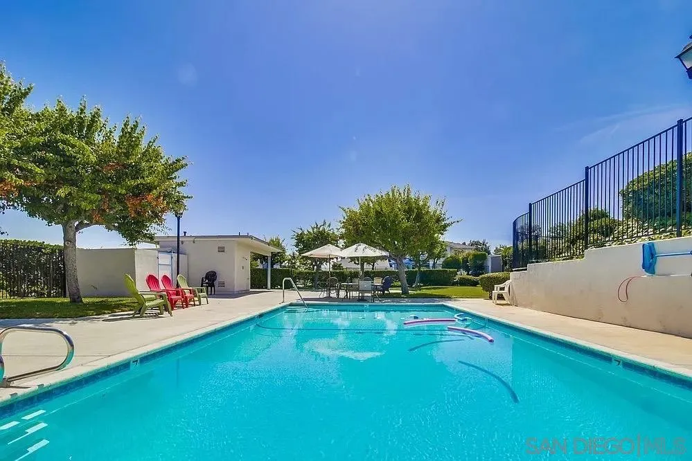 7967 Arly Court, Unit 24 Santee, CA 92071 - Photo 24 of 25 a swimming pool with outdoor seating and yard