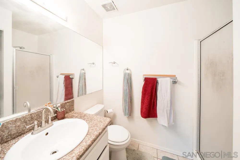 7967 Arly Court, Unit 24 Santee, CA 92071 - Photo 9 of 25 a bathroom with a sink toilet and shower