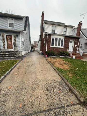 front view of house with a yard