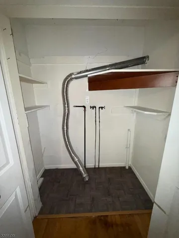 a kitchen with a sink and a stove top oven