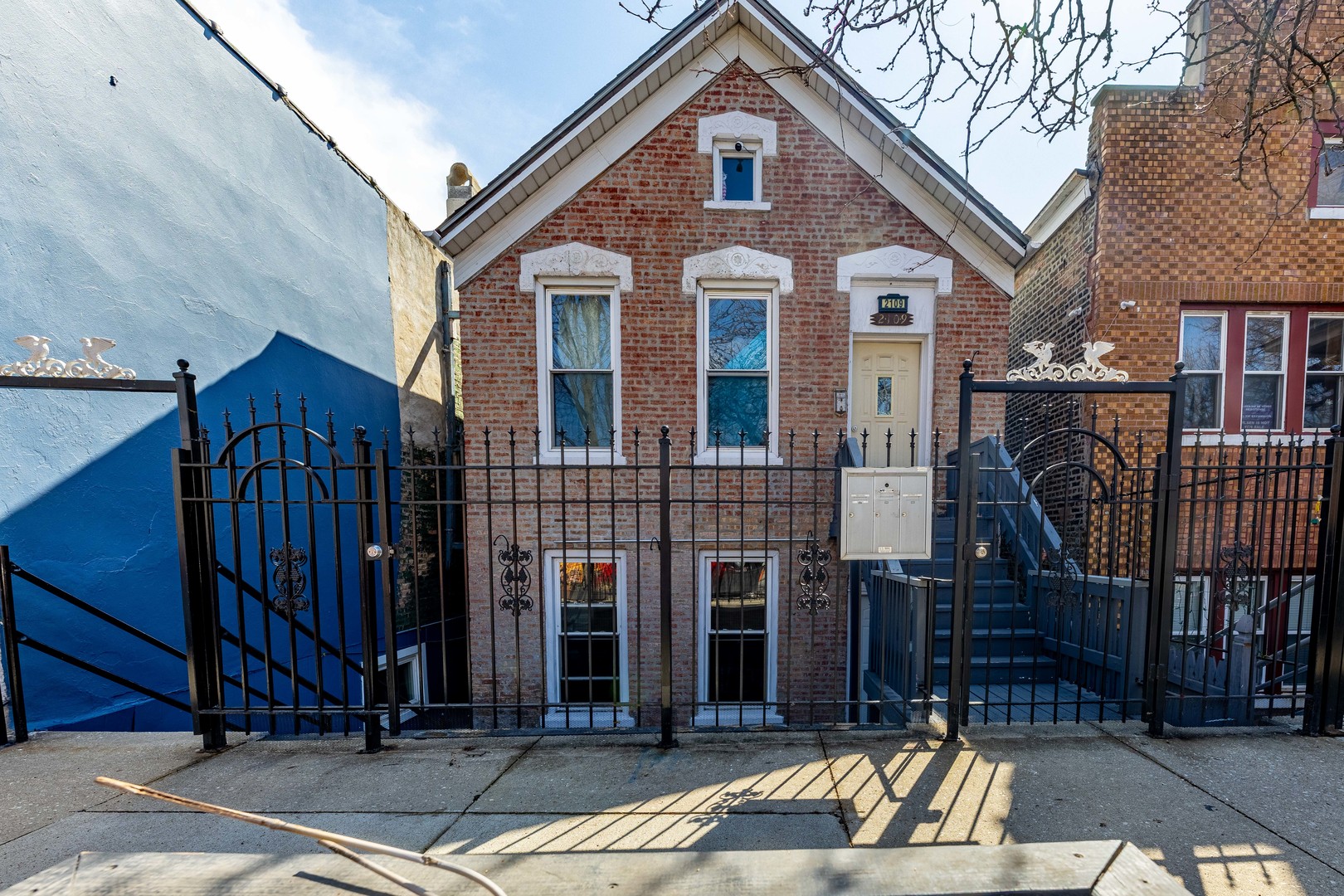 2109 West Cullerton Street Chicago, IL 60608 - Photo 1 of 14 a view of a brick house with many windows