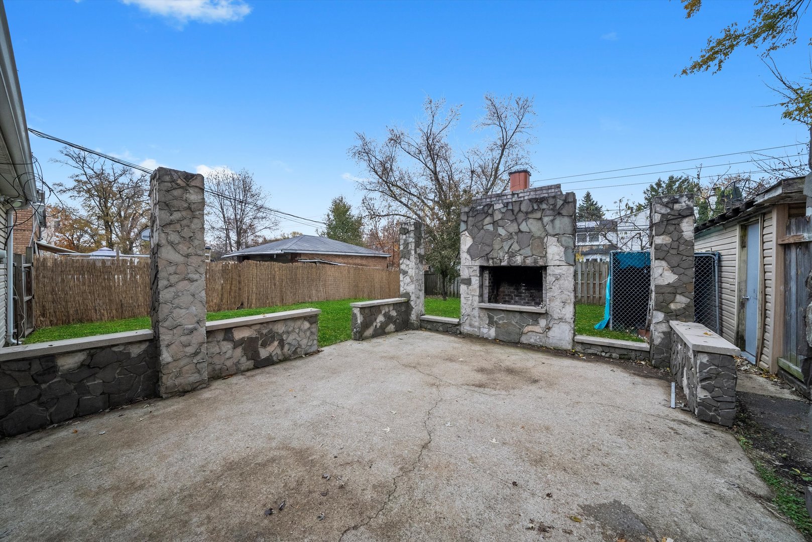473 Rockhurst Road Bolingbrook, IL 60440 - Photo 22 of 26 a view of a chair and table in the backyard