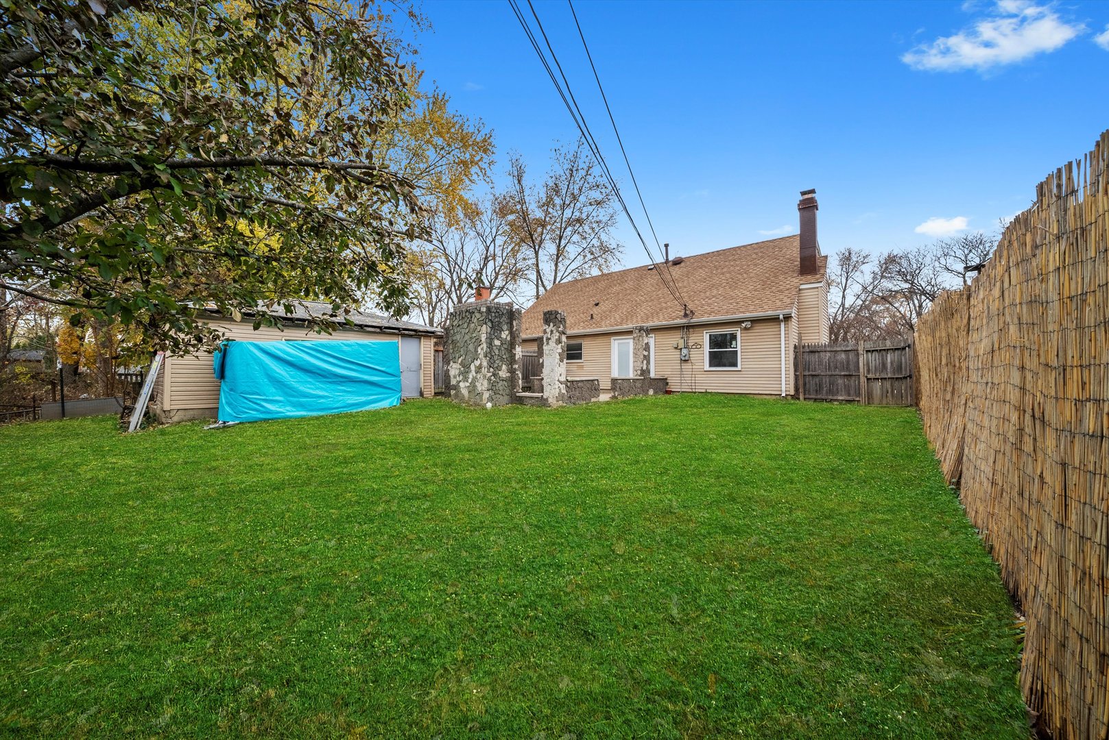 473 Rockhurst Road Bolingbrook, IL 60440 - Photo 24 of 26 a house view with a garden space