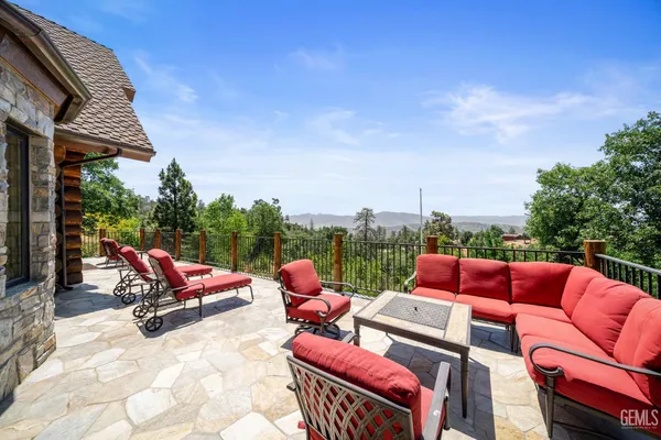 a outdoor space with patio the couches and a table