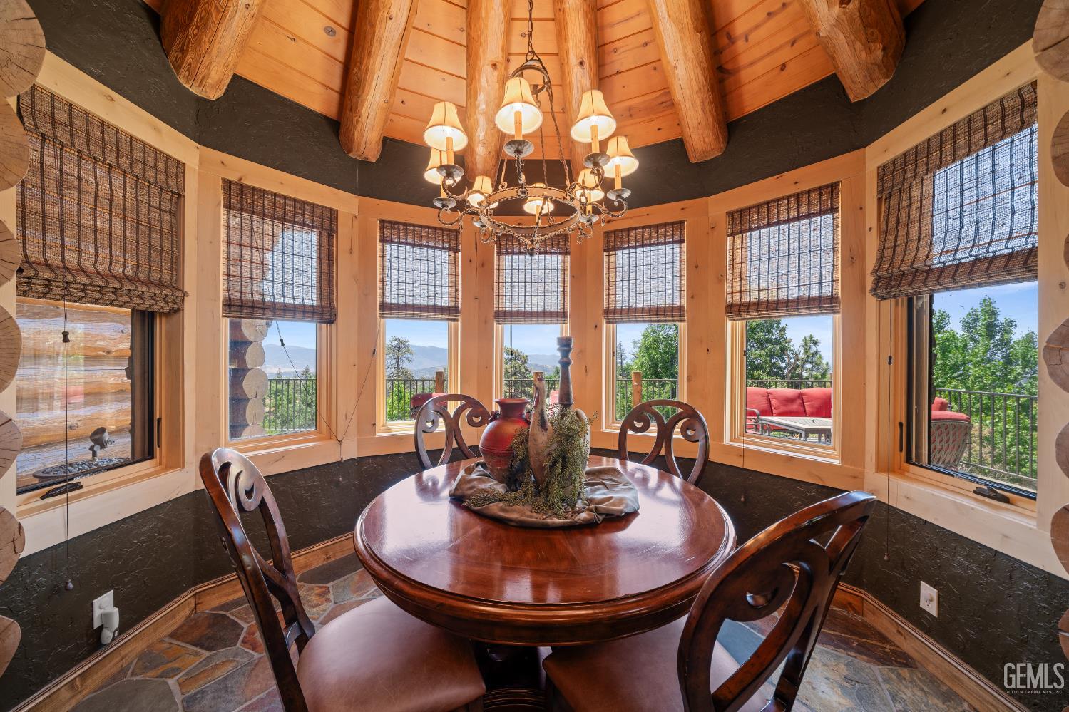 Undisclosed Address Tehachapi, CA 93561 - Photo 15 of 73 a dining room with furniture a chandelier and wooden floor