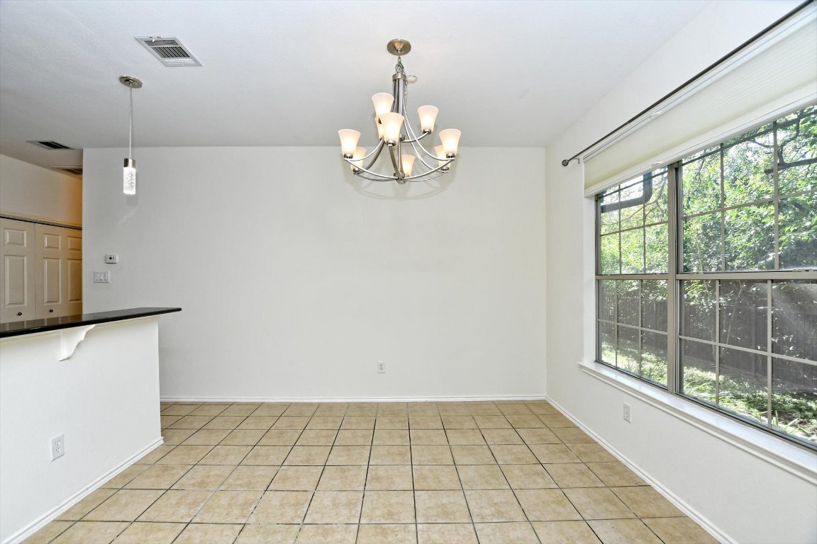 1310 West Parmer Lane, Unit 2803 Austin, TX 78727 - Photo 15 of 40 a view of an empty room with a window