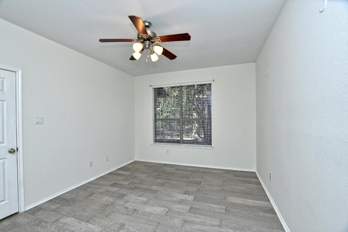 1310 West Parmer Lane, Unit 2803 Austin, TX 78727 - Photo 22 of 40 a view of an empty room with a window