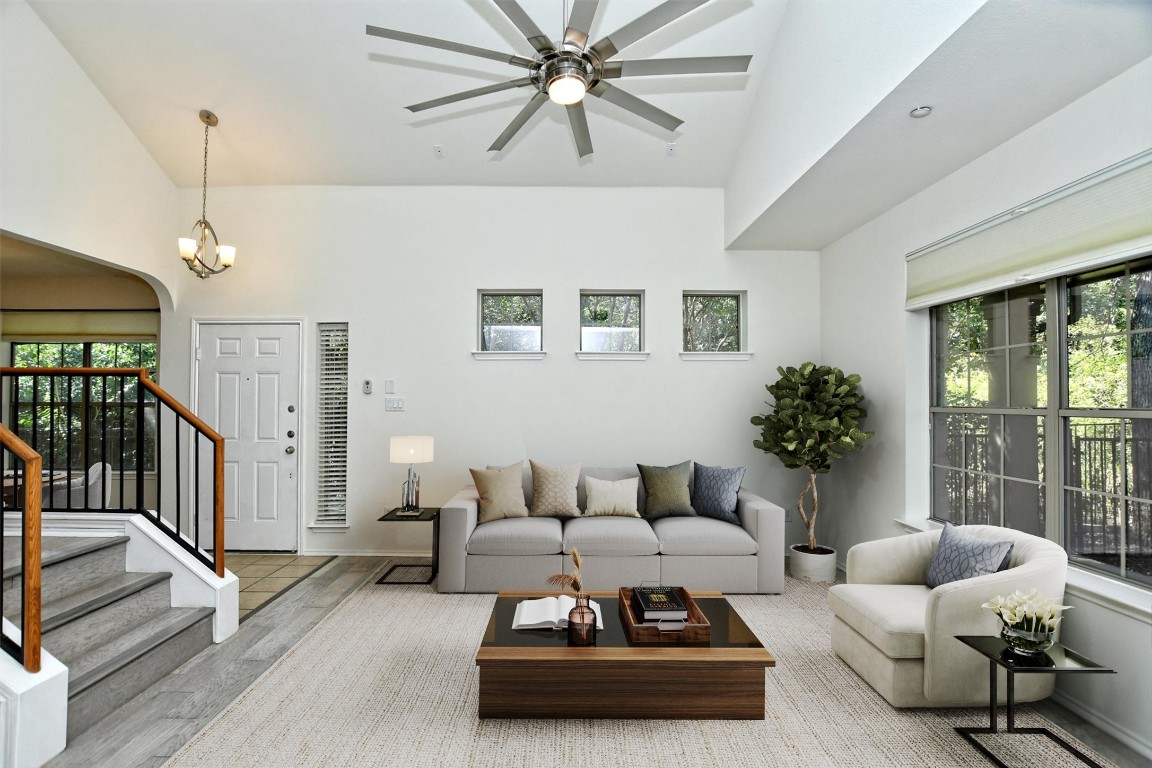 1310 West Parmer Lane, Unit 2803 Austin, TX 78727 - Photo 9 of 40 a living room with furniture and a large window