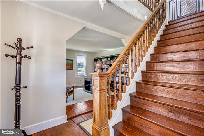 9333 Watkins Road Gaithersburg, MD 20882 - Photo 23 of 65 a view of entryway and hall with wooden floor