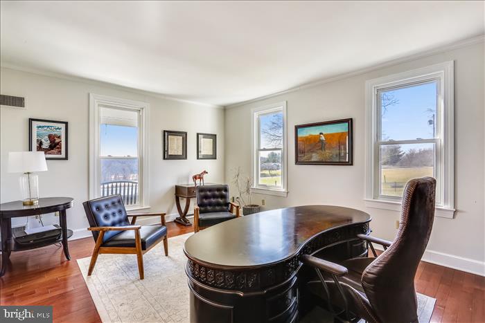 9333 Watkins Road Gaithersburg, MD 20882 - Photo 25 of 65 a living room with furniture a flat screen tv and a window