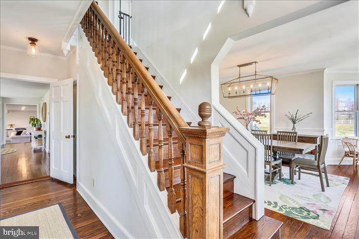 9333 Watkins Road Gaithersburg, MD 20882 - Photo 31 of 65 a living room with wooden floor and stairs