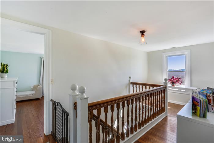 9333 Watkins Road Gaithersburg, MD 20882 - Photo 32 of 65 a view of a hallway to a livingroom with furniture