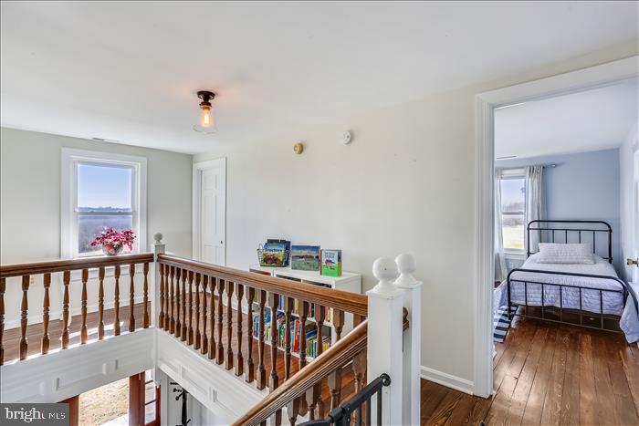 9333 Watkins Road Gaithersburg, MD 20882 - Photo 33 of 65 a view of a room with furniture and wooden floor