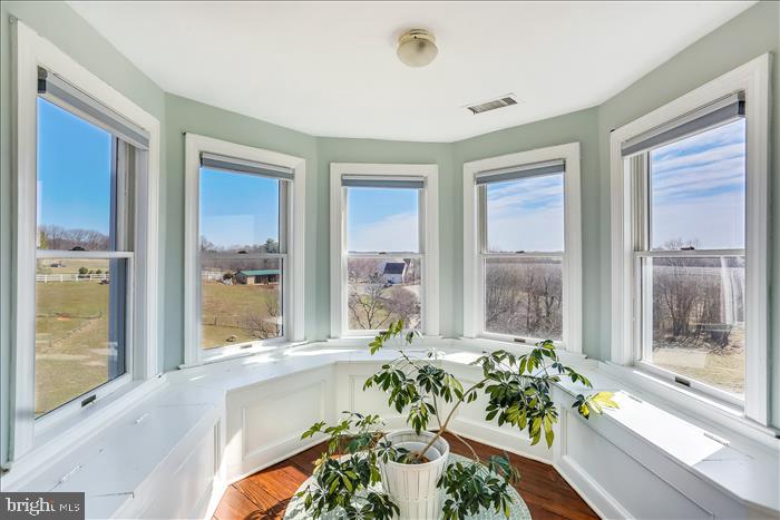 9333 Watkins Road Gaithersburg, MD 20882 - Photo 43 of 65 a view of a living room and a floor to ceiling window