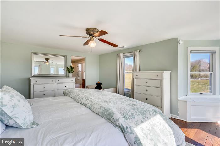 9333 Watkins Road Gaithersburg, MD 20882 - Photo 46 of 65 a bedroom with a bed and a dresser