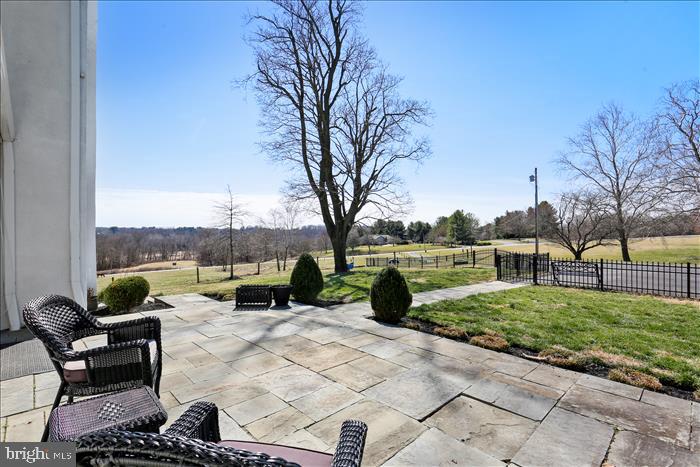 9333 Watkins Road Gaithersburg, MD 20882 - Photo 54 of 65 a view of a backyard with sitting area