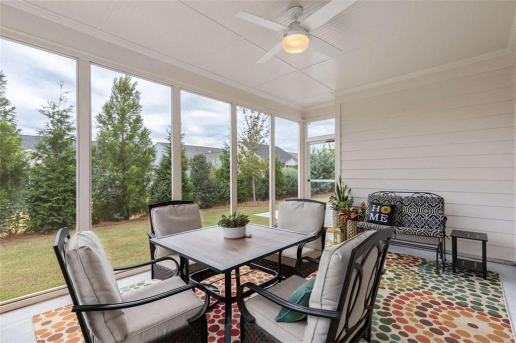 5213 Morrell Road Hoschton, GA 30548 - Photo 39 of 49 a view of a dining room with furniture window and outside view