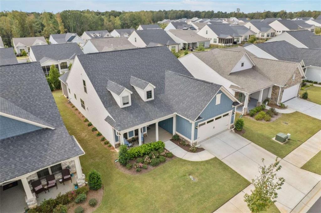 5213 Morrell Road Hoschton, GA 30548 - Photo 44 of 49 an aerial view of residential house with yard and parking space