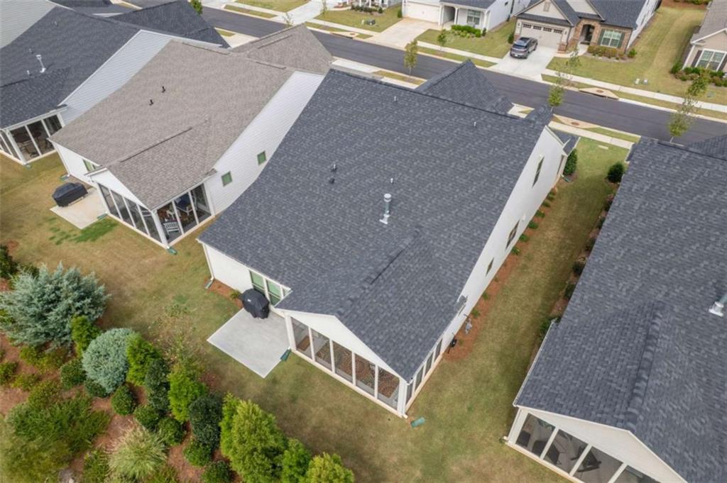 5213 Morrell Road Hoschton, GA 30548 - Photo 47 of 49 an aerial view of a house with a swimming pool