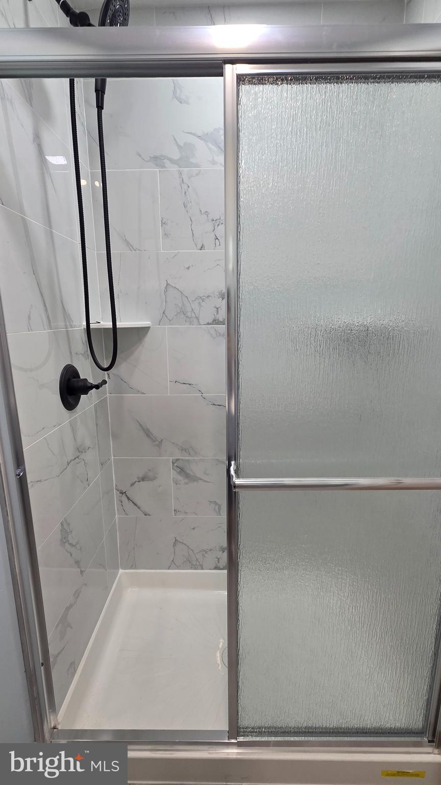 6519 Cutler Street Philadelphia, PA 19126 - Photo 16 of 24 a bathroom with a shower