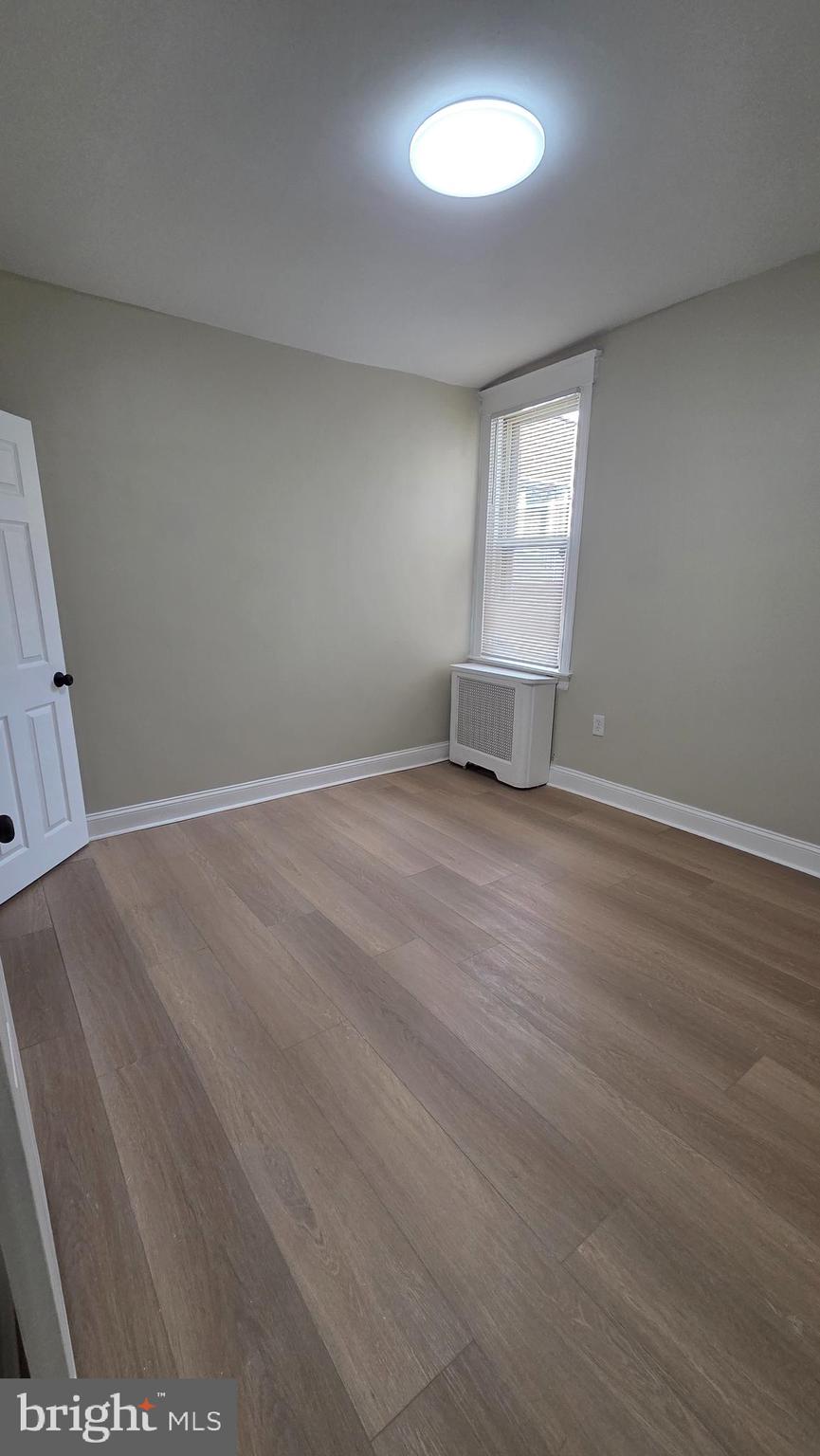 6519 Cutler Street Philadelphia, PA 19126 - Photo 17 of 24 an empty room with windows