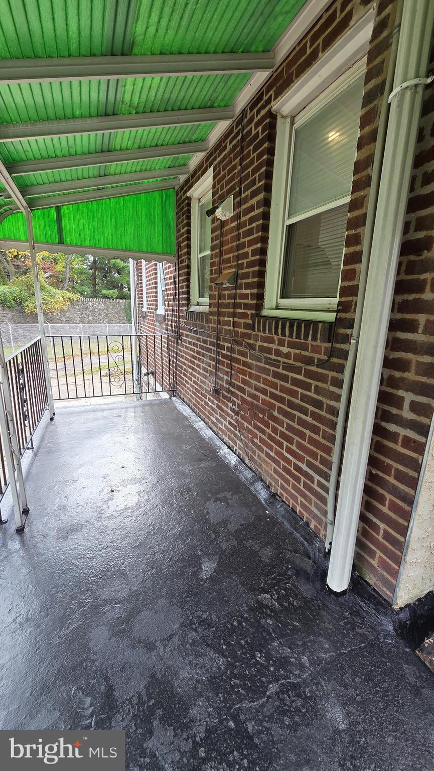 6519 Cutler Street Philadelphia, PA 19126 - Photo 23 of 24 a view of a backyard with a small cabin