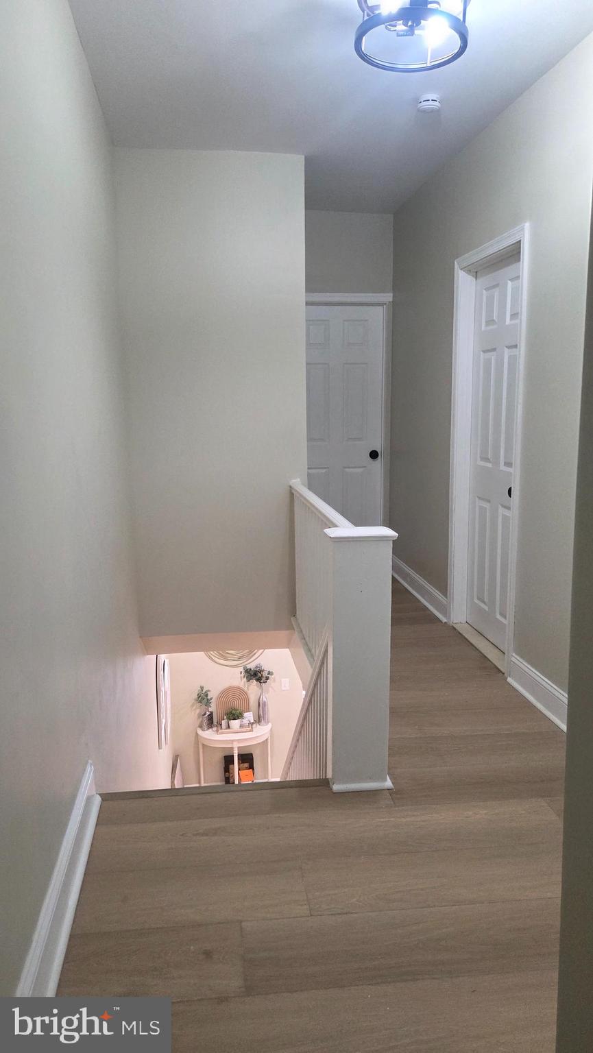 6519 Cutler Street Philadelphia, PA 19126 - Photo 10 of 24 a room with a bed and a night stand