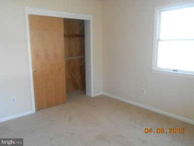 7384 Station Road Newcomb, MD 21653 - Photo 8 of 10 an empty room with a window