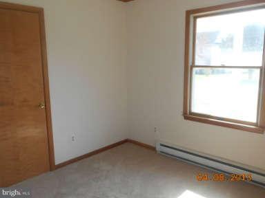 7384 Station Road Newcomb, MD 21653 - Photo 9 of 10 a room that has a window