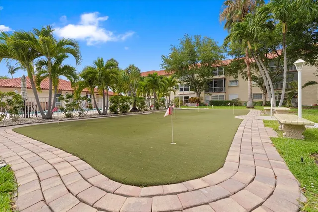 a view of a swimming pool with outdoor space