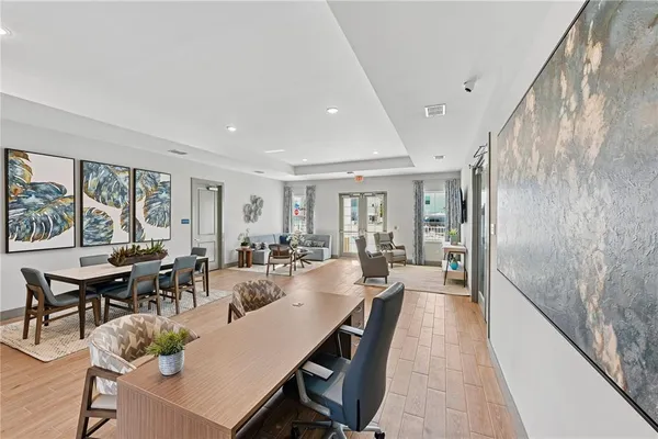 a living room with furniture and a rug
