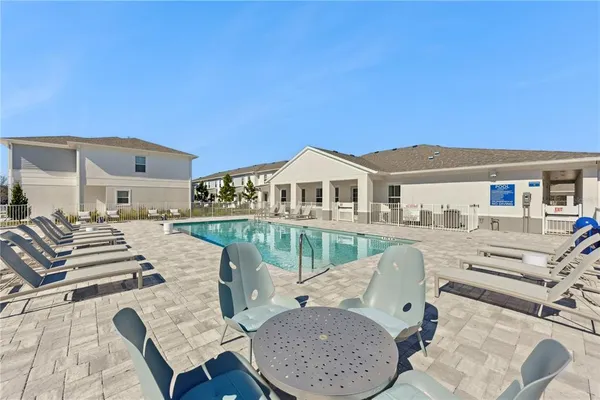 a view of park with large trees