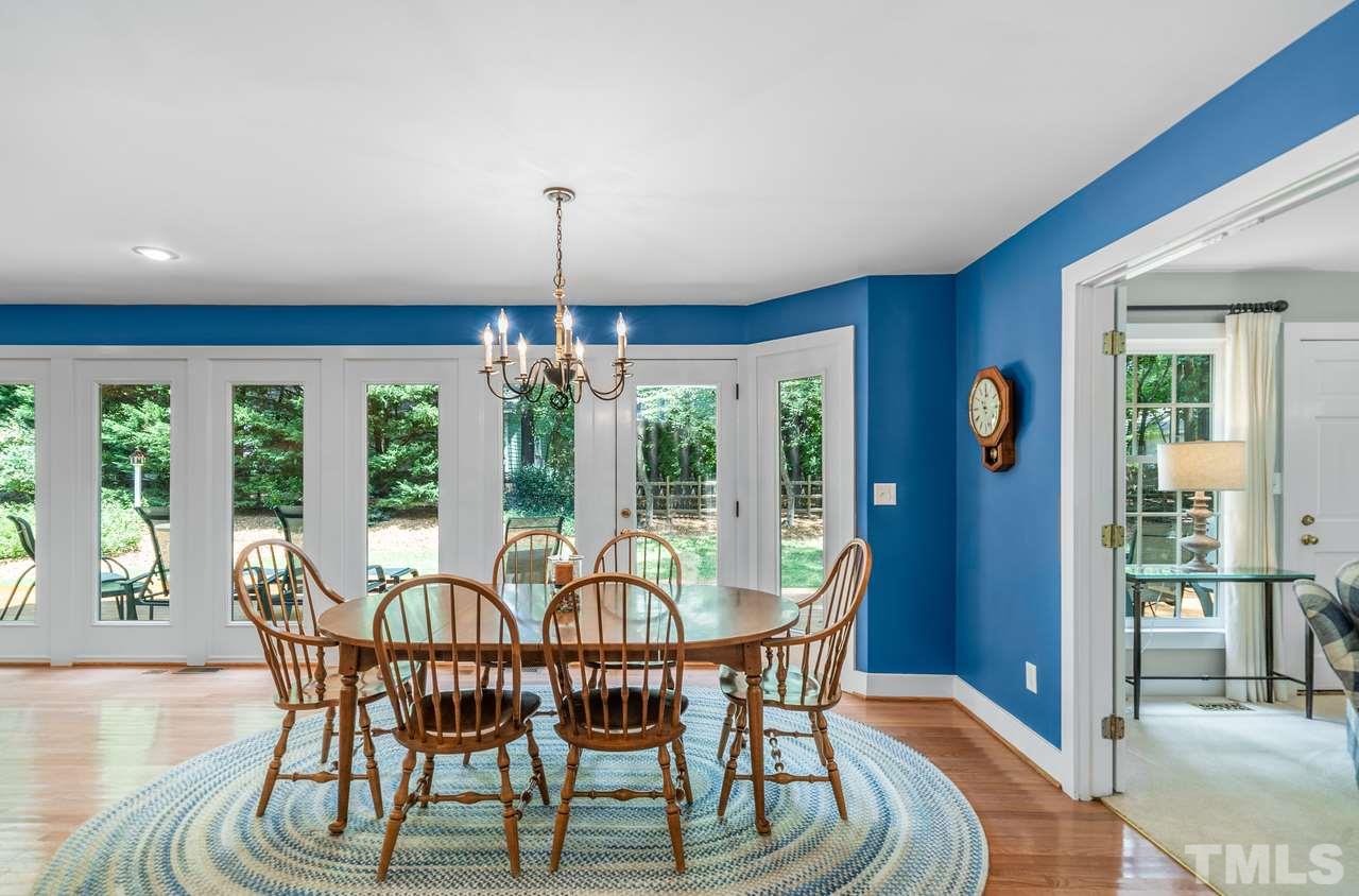 301 Pasture Lane Raleigh, NC 27614 - Photo 14 of 29 a view of a dining room with furniture window and outside view