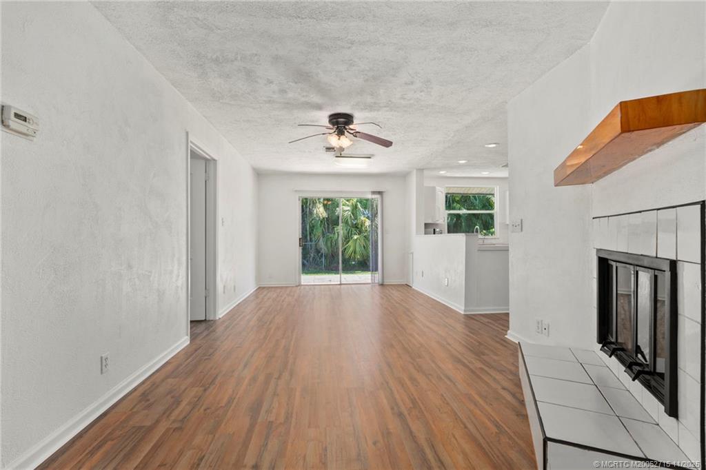 5801 Southeast Cable Drive Stuart, FL 34997 - Photo 19 of 48 wooden floor in an empty room with a window